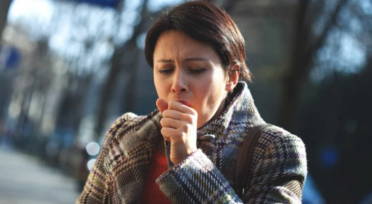 woman coughing